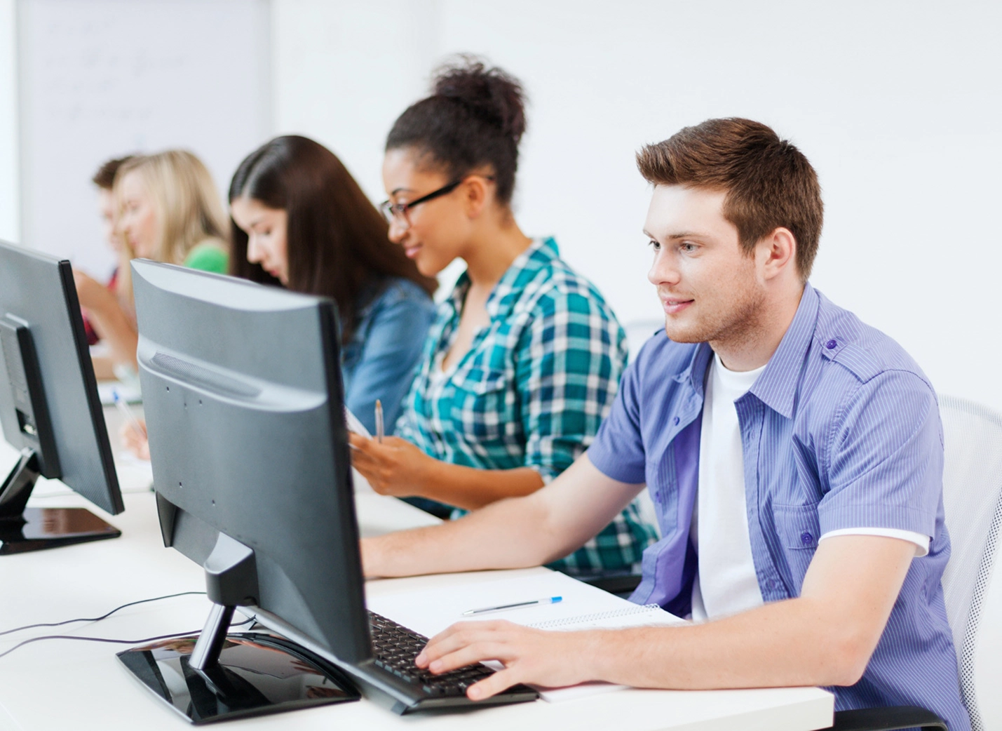 Students taking a computer-based exam