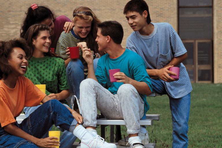 International students hanging around outside a school